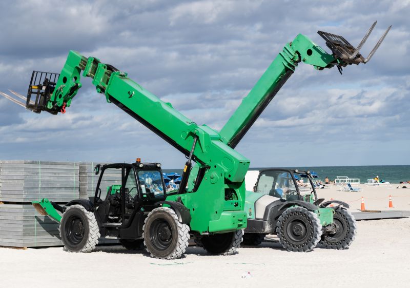 Telehandlers can use forks, buckets, and lifting jibs for different tasks.